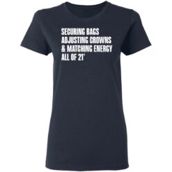 Securing bags adjusting crowns and matching energy all of 21' shirt $19.95