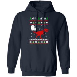 Santa Claus rides in a sleigh on the dinosaur Christmas sweater $19.95