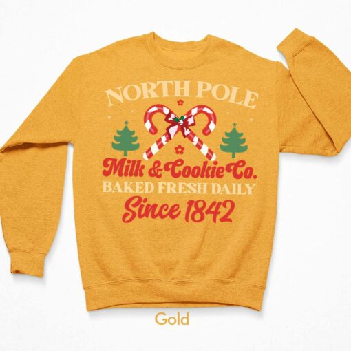 North Pole Milk and Cookie Co Baked Fresh Daily Since 1842 Sweatshirt $30.95